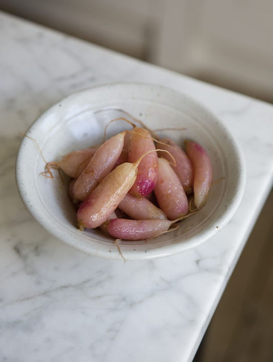 Radishes poached in chicken stock